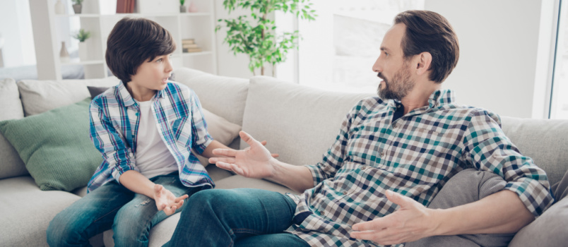 Father and son talking each other