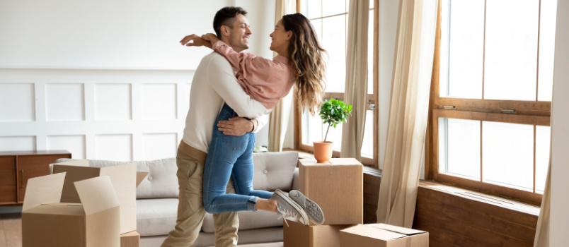 Young couple moving to new home