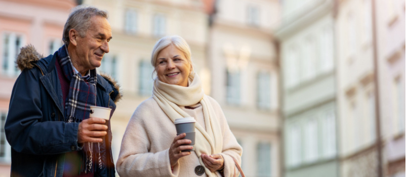 Senior couple walking in street