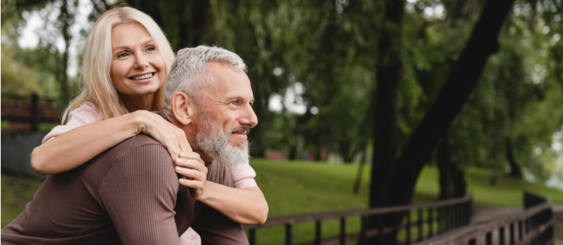 Happy middle aged couple embracing each other