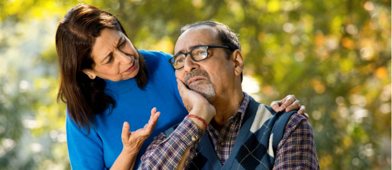 Senior woman comforting sad woman