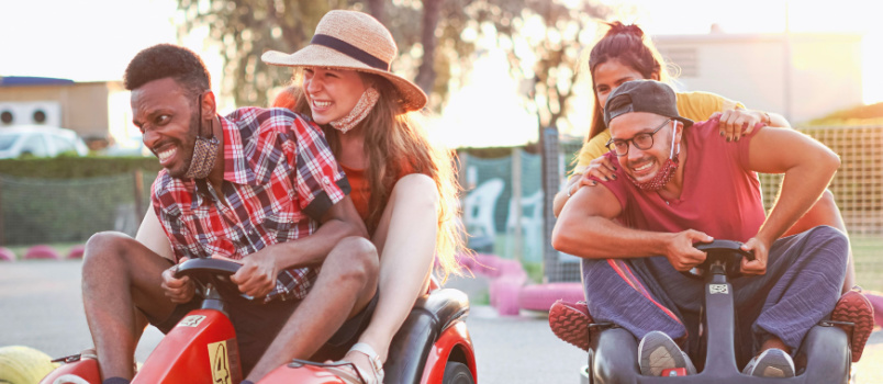 Friends having fun driving go cart