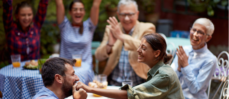 Guy kissing girlfriend on hands