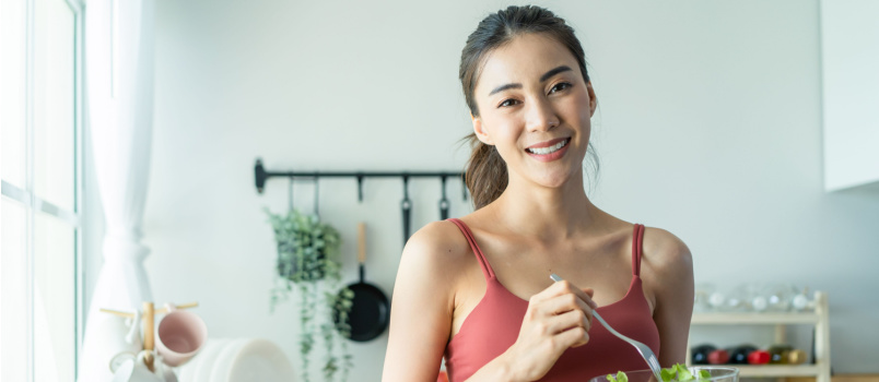 Woman having salad