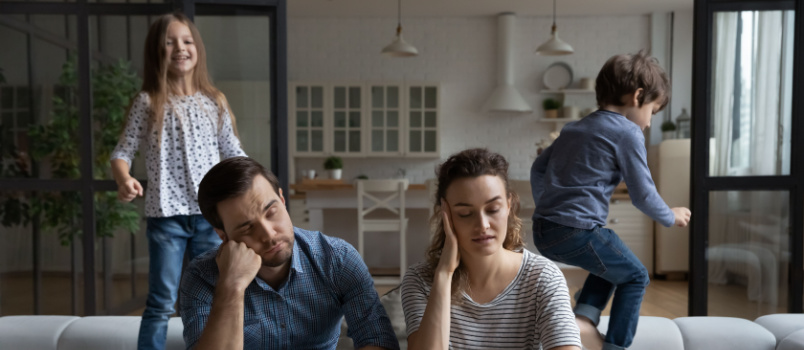 Exhausted tired couple parents