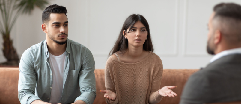 Young lady talking to psychologist