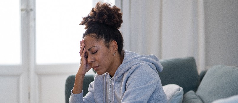 Young attractive sad affrican woman