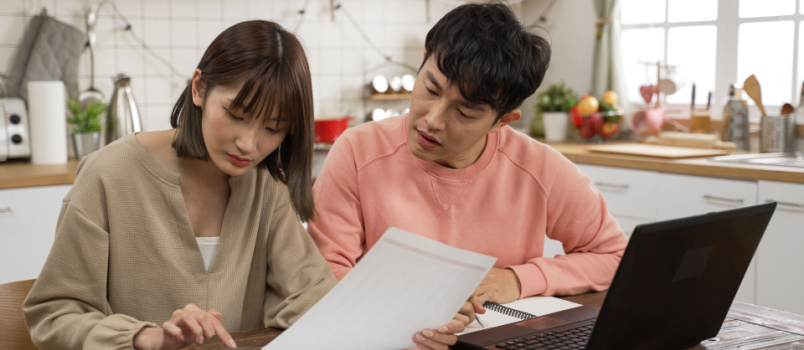 Couple calculating finance