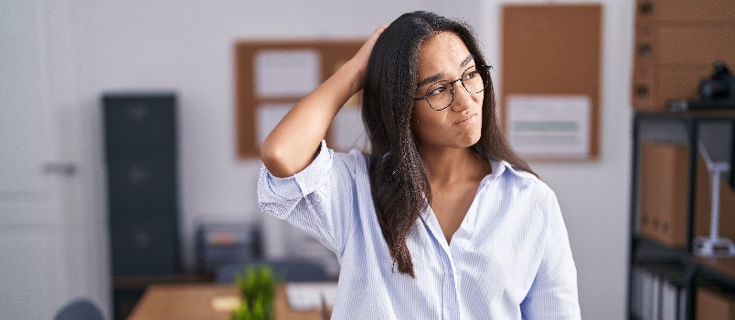Confused woman in office