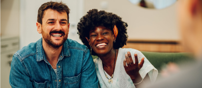 Happy couple having psychology session