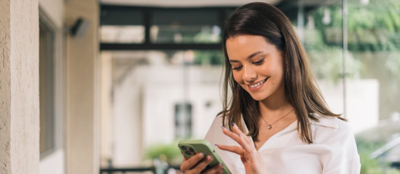 business woman texting on phone