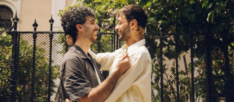 Gay couple celebrating together