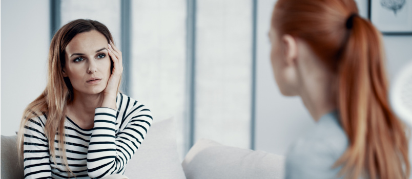 Woman consulting psychiatrist