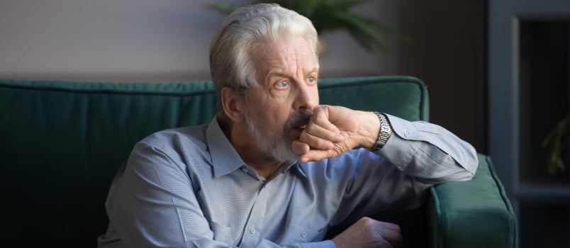 Mature man sitting alone