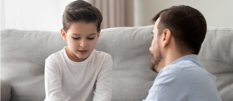 Worried son holding father hands