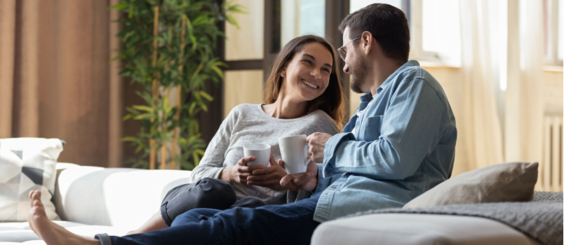 Happy couple having coffee