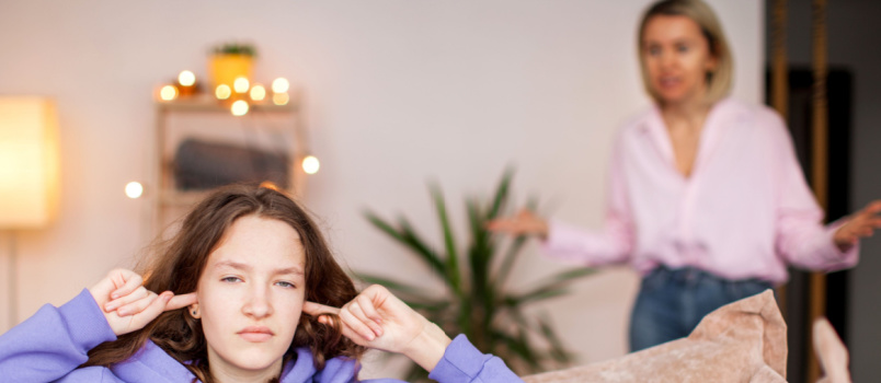Woman scolding teenager