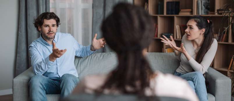Couple having argument infront of therapist