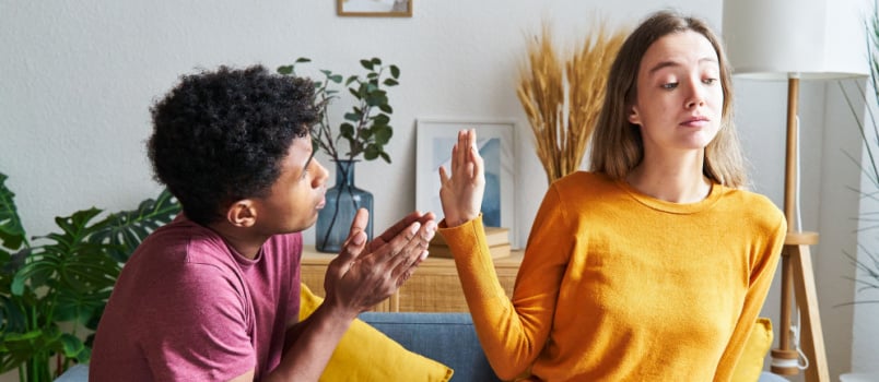 Man saying sorry to woman