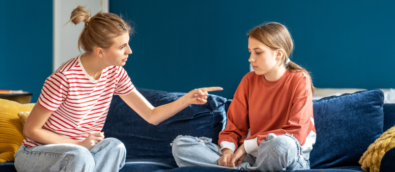 Angry mother scolding child