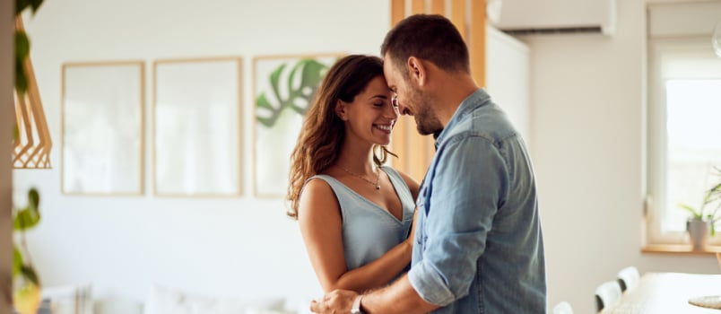 Happy couple hugging each other