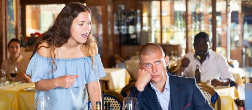 Disgruntled man and woman quarreling emotionally gesturing