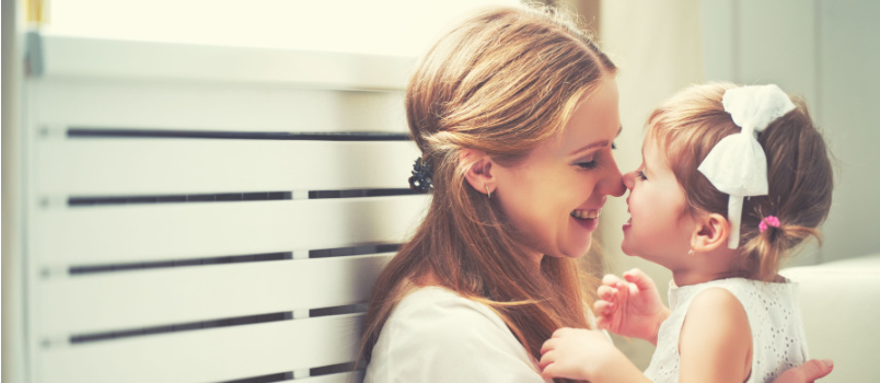 Mother playing with her daughter
