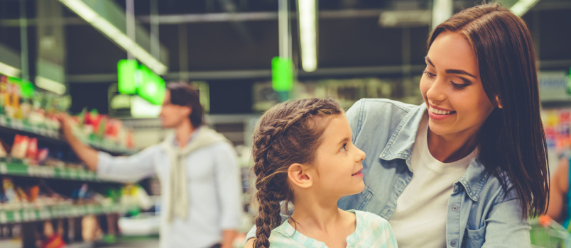 Young woman and daughter doing shopping
