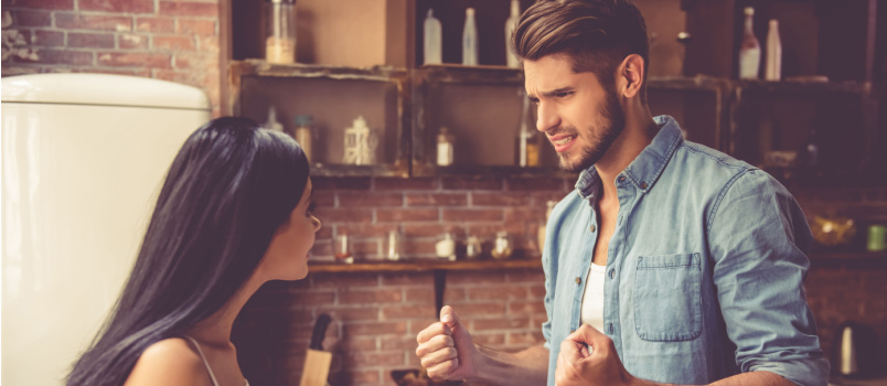 Young couple quelling in kitchen