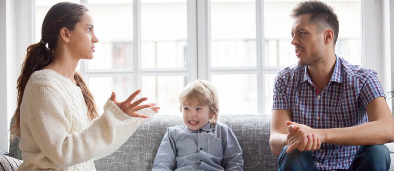 Couple fighting in front of kids