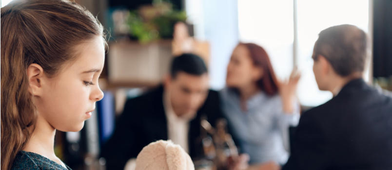 Young couple having argument infront of kid
