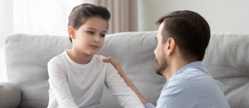 Father and son talking to each other