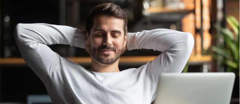 Happy relaxed business man