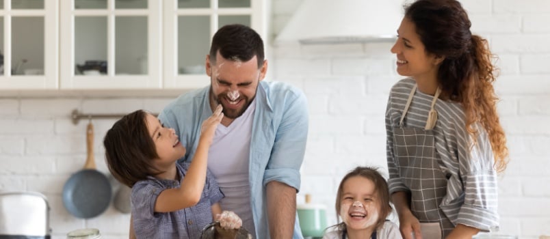 Family enjoying in kitchen