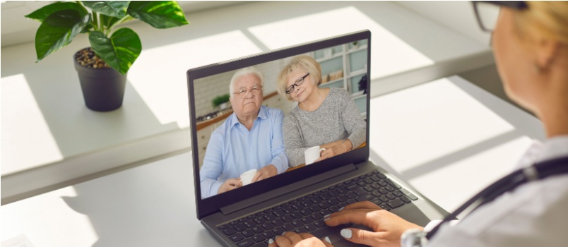 Old couple having online counselling session