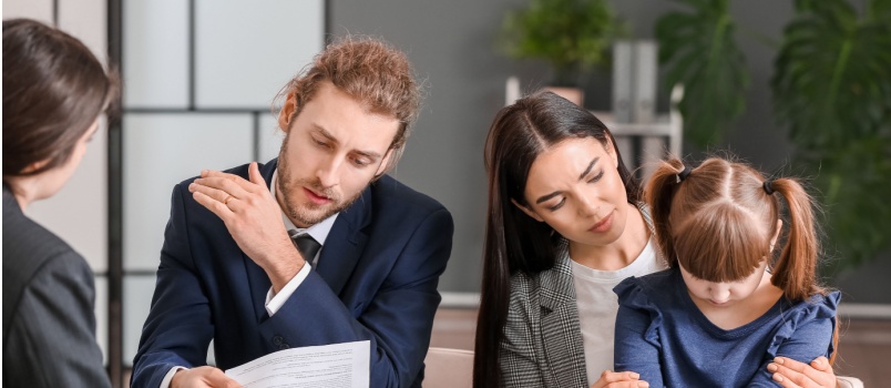 Couple visiting divorce lawyer with their kid