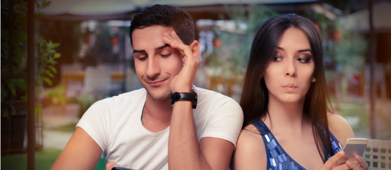 Couple using smartphone