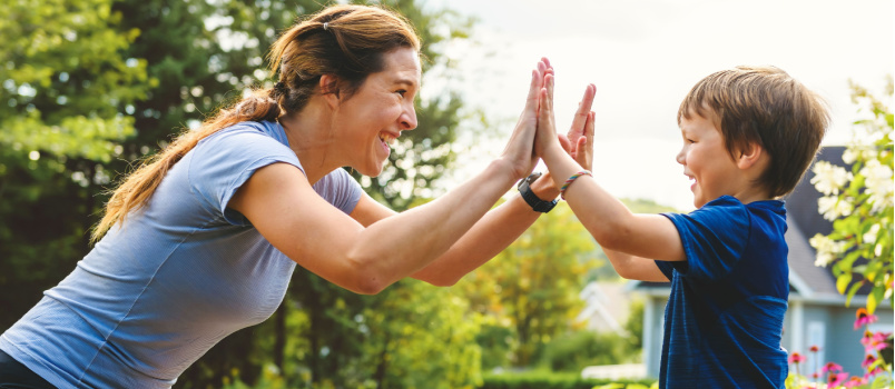 Mother son playing outside