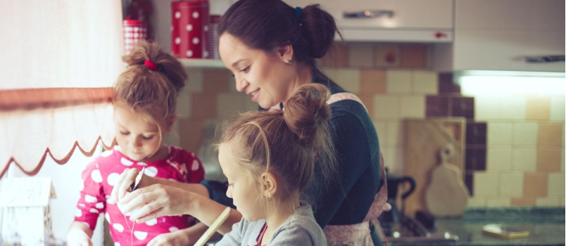 Mother and kid cooking together
