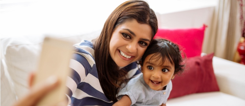 Mother and daughter taking selfie
