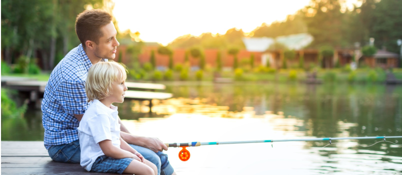 Dad son fishing on lake