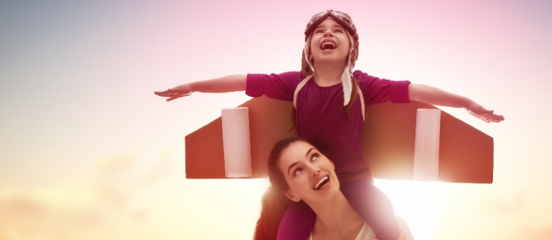 Mother and kid playing together