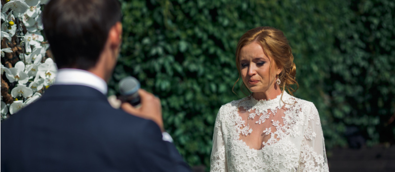 Bride tries keep her tears