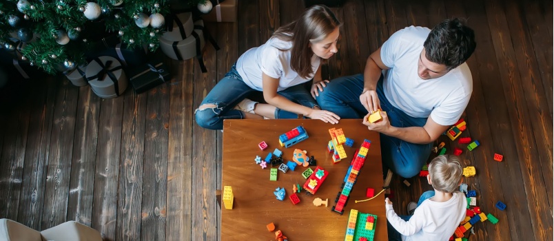 Kids playing with  dad