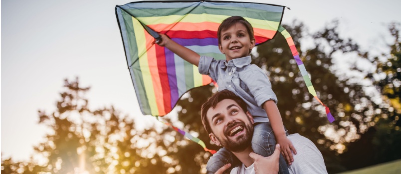 Dad and son playing together