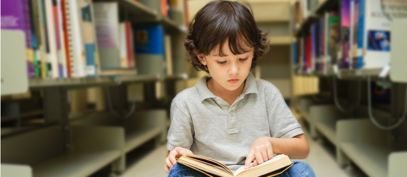 Kid reading book