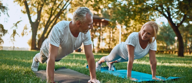 Senior couple doing yoga