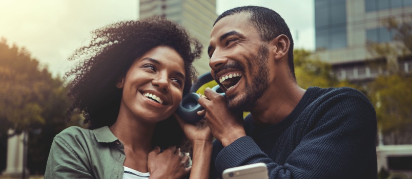 Young couple listening to music