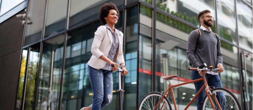 Business people going to work through bicycle
