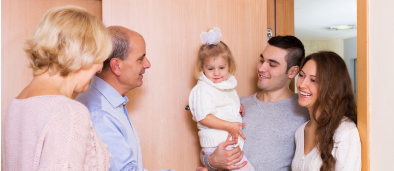 Young family daughter visiting grandparents
